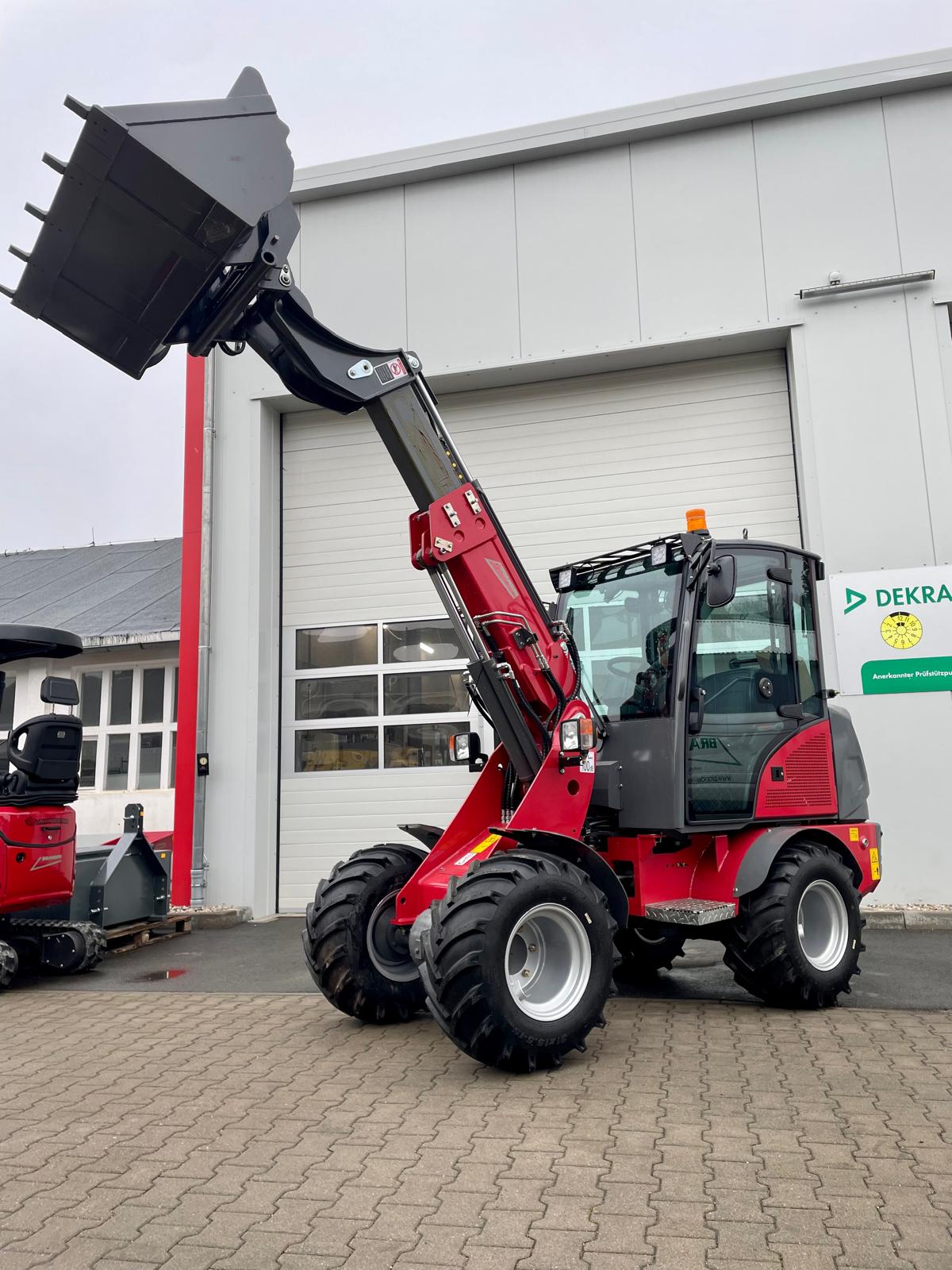Telescopic wheel loader with cab & Kubota engine – 1200 kg rated load | Professional skid steer loader