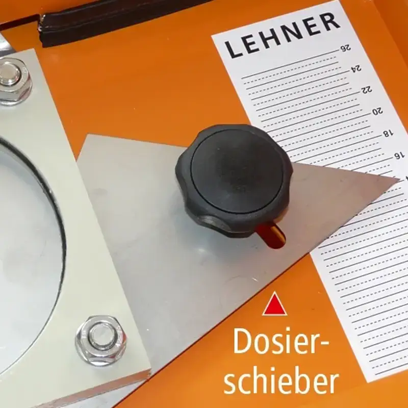 Dosierschieber, Metall, schwarzer Drehknopf, orange Baugruppe