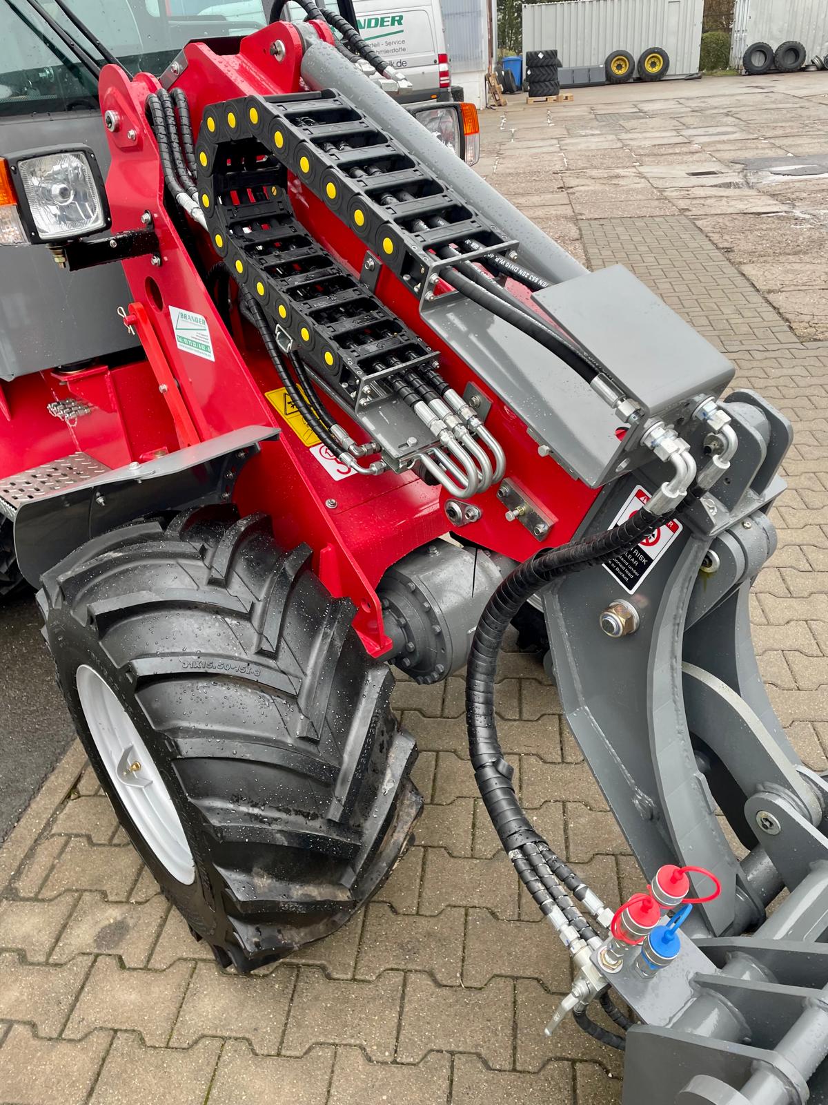 Telescopic wheel loader with cab & Kubota engine – 1200 kg rated load | Professional skid steer loader