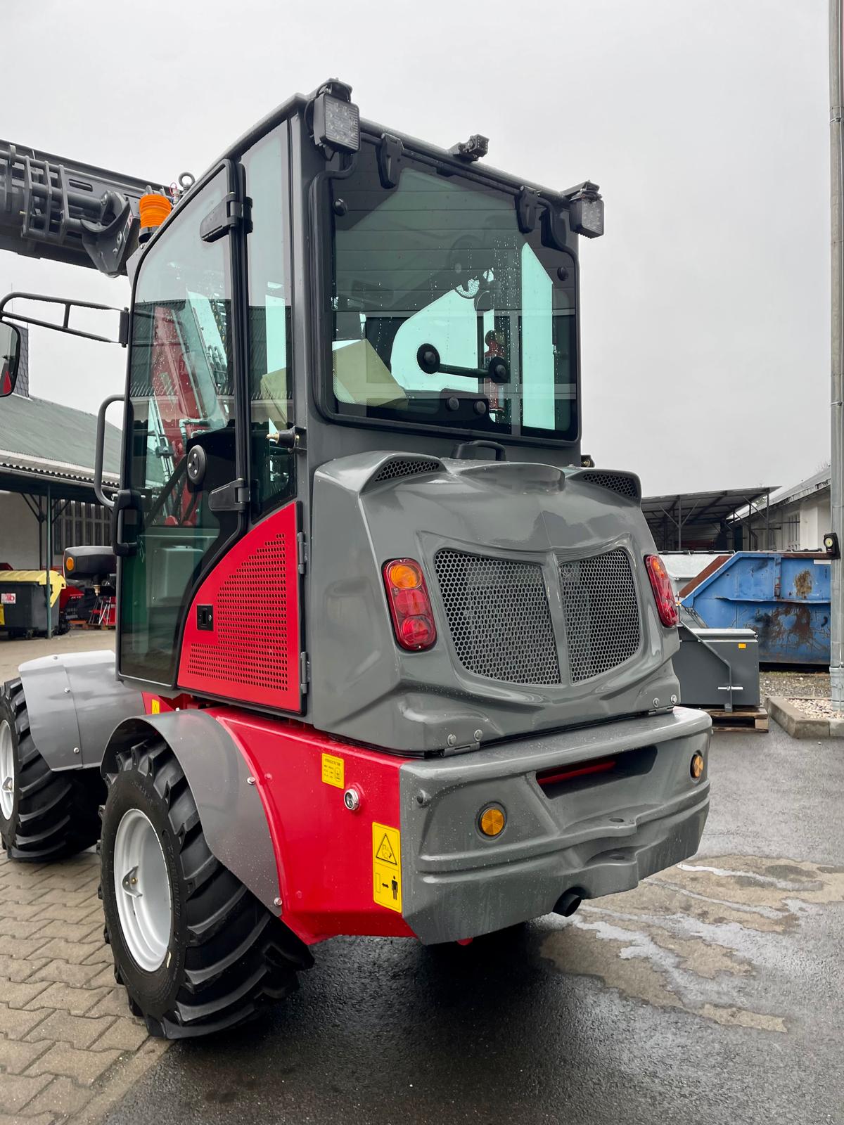 Telescopic wheel loader with cab & Kubota engine – 1200 kg rated load | Professional skid steer loader