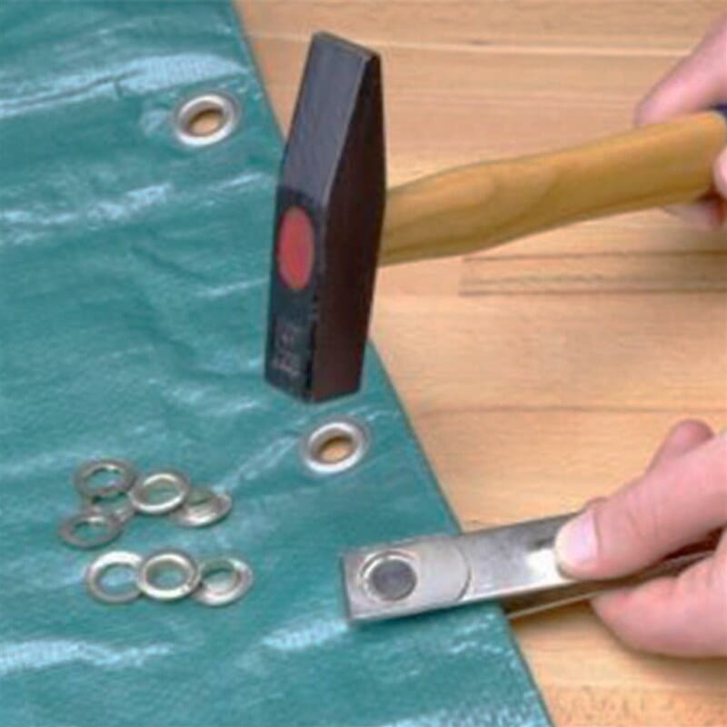Eyelet set and eyelet pliers for tarpaulins