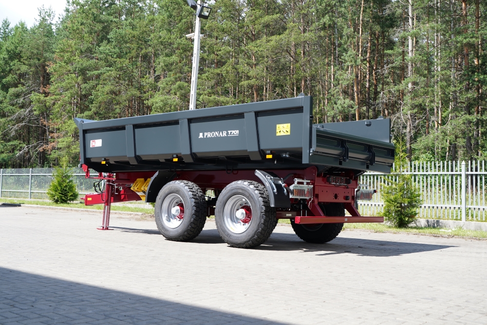 dump trailer, heavy-duty trailer, dual axle, off-road tires, metallic gray