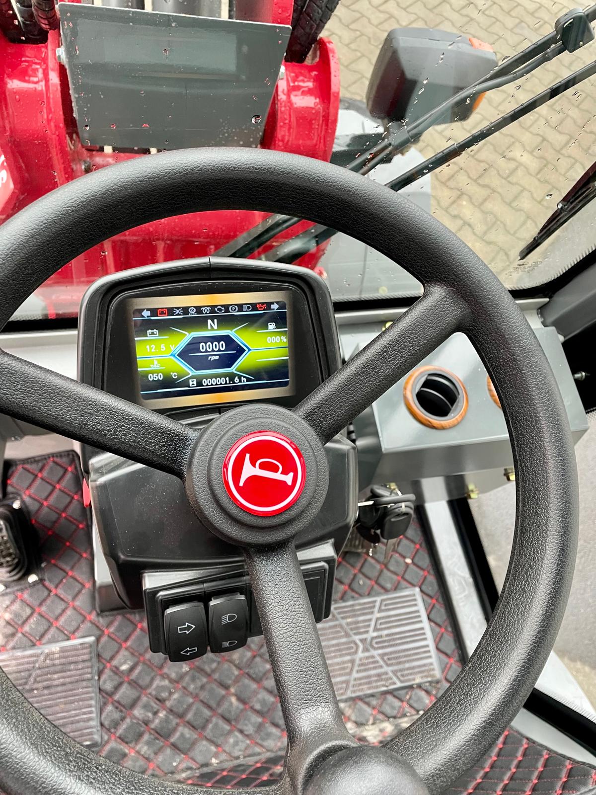 Telescopic wheel loader with cab & Kubota engine – 1200 kg rated load | Professional skid steer loader