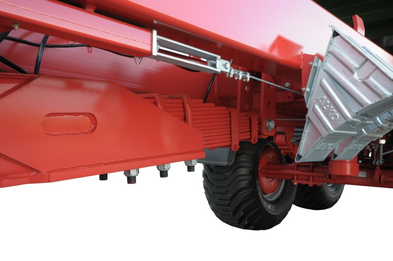 landscape-tilt, heavy-duty vehicle, orange machinery, tire tread, metal chassis